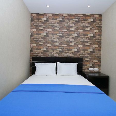 A Pousada Kamar Keluarga Kampung Bali III Jacarta Exterior foto