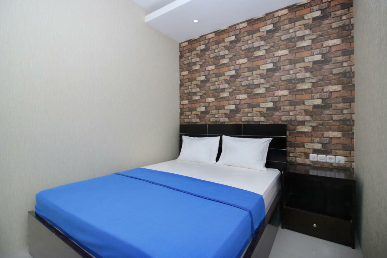 A Pousada Kamar Keluarga Kampung Bali III Jacarta Exterior foto